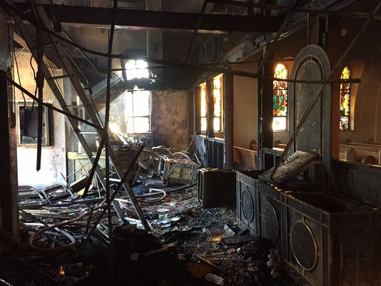 Corcoran said firefighters were attempting to get inside to put out the flames and a concrete cross fell on one of the firefighters. The injured firefighter was taken to the hospital with possible neck and back injuries, but Corcoran said he was alert and conscious.(Photo: Knoxville Fire Department)