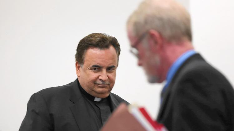 Critics have called for the Rev. James Dokos to be removed from the priesthood following his guilty plea Feb. 22, 2016, in Milwaukee to a felony theft charge. (Abel Uribe / Chicago Tribune 2014)