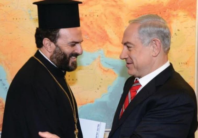 Father Gabriel Naddaf and Prime Minister Benjamin Netanyahu in August 2013.. (photo credit:Wikimedia Commons) 