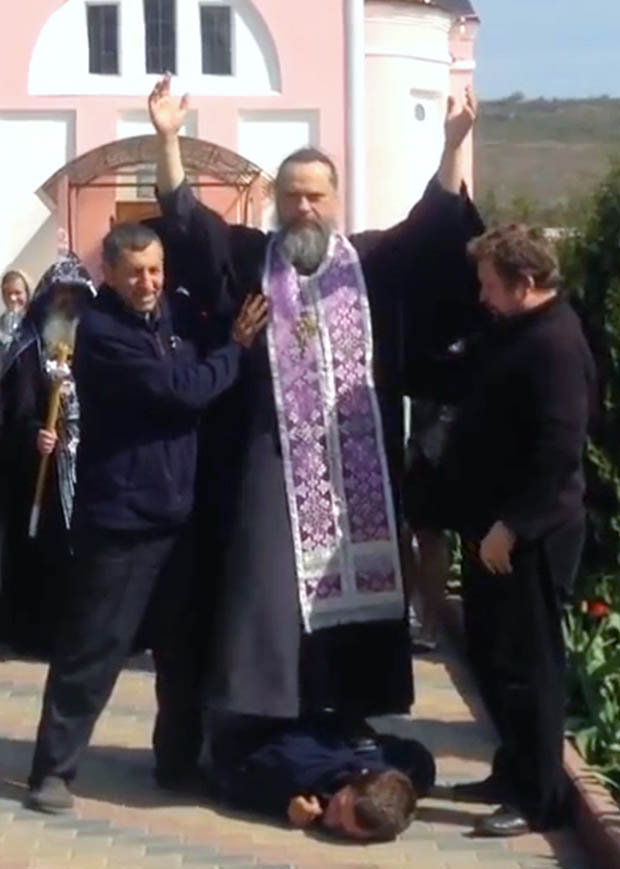 FREED: The priest declares the demon has left the man [CEN] 