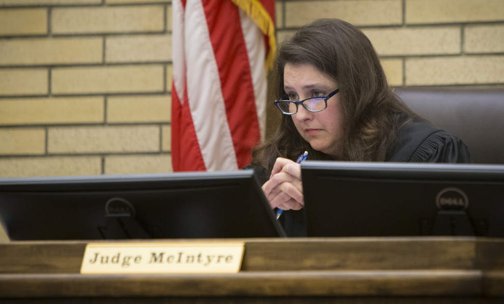 Lane County Circuit Judge Karrie McIntyre listens to character witness for Eugene priest Daniel MacKay, Abbot Tryphon of the All-Merciful Saviour Monastery on Vashon Island, Wash., before McKay was sentenced. (Andy Nelson/The Register-Guard)