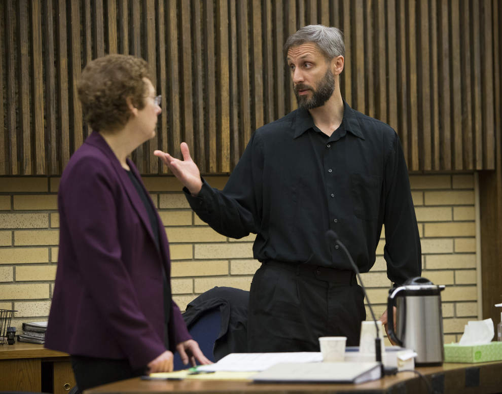 Eugene priest Daniel MacKay apologizes to his supporters before he was sentenced Thursday as his attorney, Terri Wood stands nearby. (Andy Nelson/The Register-Guard)