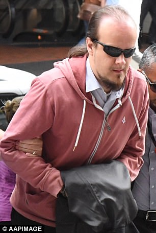 Russian Orthodox priest Stanislav Vakhabov (pictured) is accused of forcing a boy, 14, to drink alcohol and climbing on top of him in bed while he visited Australia  