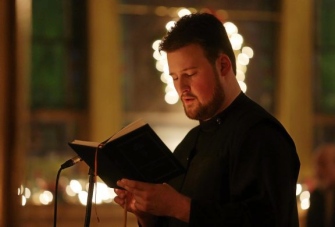 Matthew Romanchak of Pittsburgh gives a reading during the Great Compline with Matins Service in St. John's Russian Orthodox Cathedral in Mayfield, Pa., on Wednesday, Jan. 6, 2016. (Jake Danna Stevens/The Times-Tribune via AP) WILKES BARRE TIMES-LEADER OUT; MANDATORY CREDIT
