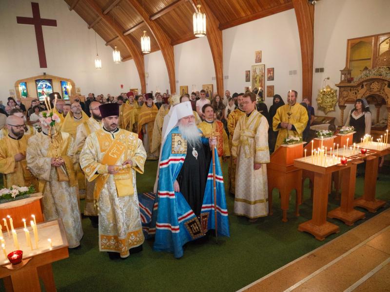 Protodeacon Jesse Isaac is pictured at Metr. Tikhon's right during the recent Canadian Archdiocesan Assembly. Photo: oca.org