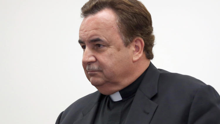 Rev. James Dokos in court on July 18. (Abel Uribe, Chicago Tribune)