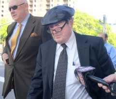 Michael J. Pasonick Jr., leaves federal court in May with his attorney, Joseph Sklarosky Sr. Mark Moran / The Citizens' Voice