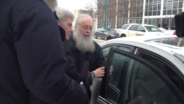 Winnipeg archbishop Seraphim Storheim leaves Winnipeg court after being found guilty of sexually assault.