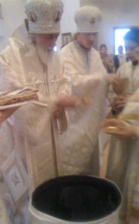 From left to right:  Bishop Nikolai, Archimandrite Isidore, Reader Terenty