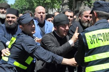 Orthodox believers confront police during a gay rights rally in Tbilisi last week. (Irakli Gedenidze/AFP/Getty Images)