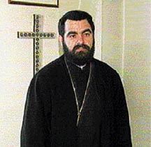 Priest Iakovos Giosakis reportedly fled the country to evade investigation into his involvement with a group alleged to have rigged court cases  