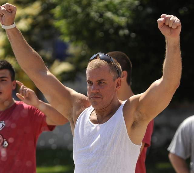 Glenn Davidowich, who was expelled from the priesthood in the Byzantine Catholic church following sex abuse claims in New Jersey, is seen here July 13 at Krazy Daze in Manitowoc, where he now lives. The New Jersey native had just hit the target on a dunk tank. / Photo by Matthew Apgar/HTR Media