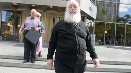 Archbishop Kenneth William (Seraphim) Storheim leaves the law courts building on Thurs., Sept. 12, 2013 in Winnipeg, Man. Credits: Kevin King/Winnipeg Sun/QMI Agency