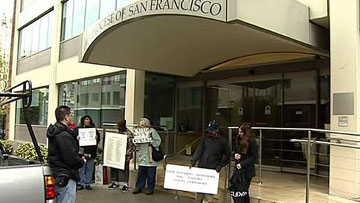 Cappy Larson at the March 29, 2010, SNAP demonstration. Cappy is the fourth person from the right in the photo.