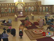 The bishop's first Sunday back was what the Russian Orthodox call the day of adoration for the precious cross. (Shawn Wilson/KTUU-TV)