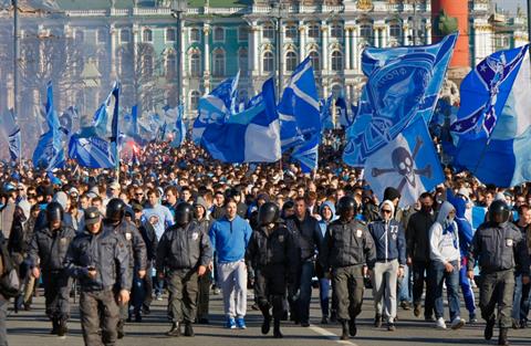 In this Saturday, April 28, 2012 file photo Zenit's fans march prior the match of their team in the national soccer Championship in downtown St.Petersburg, Russia. (AP Photo/Dmitry Lovetsky, File)