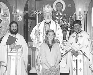 Priest-monk Alexios Marakis (left), who was attacked by a U.S. Marine reservist in Florida, is seen at a New England church.