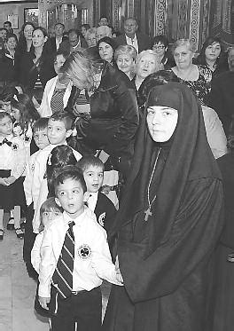 Sister Christonymphi turned over a bag of money to police. TNH Archives