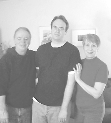 The Nevins family: Ashley and Diane Nevins embracing their son Scott after he had left the Monastery six years later.