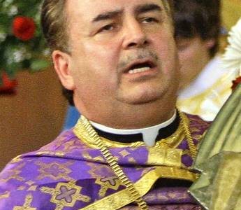 The Rev. James Dokos priest pleaded not guilty to a felony theft charge on August 26 during his arraignment in a Milwaukee County courtroom.