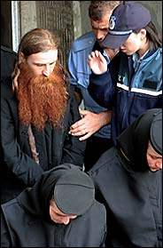 The Rev. Daniel Petre Corogeanu was arrested in June after a 23-year-old nun died after an exorcism at an isolated hilltop monastery at Tanacu. Radu Aniculaesei/Proimage, via Reuters