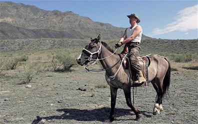 President Putin in the Sayan Mountains. A nun wrote a letter to Putin claiming that Father Konstantin controlled his disciples 'by mesmerising them' Photo: ALAMY