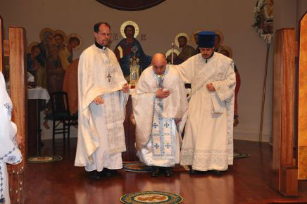 Frs. Ray Velencia and Martin (Duane) Johnson are presented to receive clergy awards.